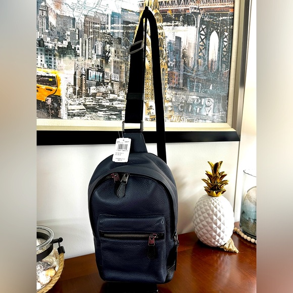 Coach Handbags - NWT Coach pebbled leather sling bag